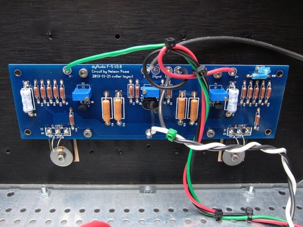 Note the small thermistors are bent down now and touch the washers holding the Mosfets.