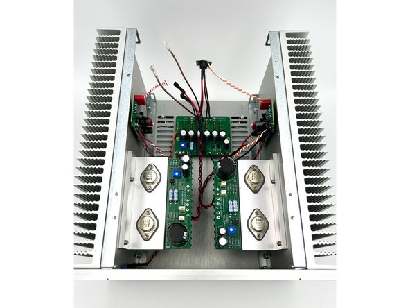 If you have not done it already, install the front panel to the chassis rails using 4 x  short M4 Phillips button head screws included with the chassis.