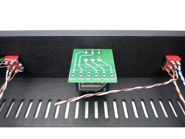Photo 2 - The middle of the switch needs to be connected to the IN pads of the pot board. In our wiring scheme so far, solid colors are right and white/trace color are left