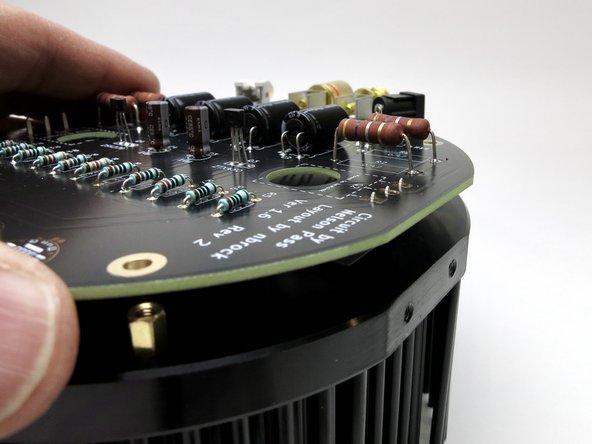 ...the (4) brass standoffs are inserted and secure,