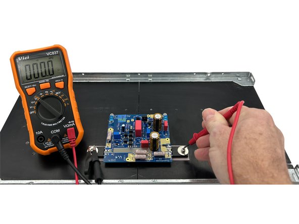 The metal back of the MOSFETs, electrically speaking, is the drain.  So, it is critical that the metal back of the MOSFETs is not in contact with the heatsinks.  The heatsinks are &quot;chassis ground&quot;.  However, we need the MOSFETs to dump their heat to the heatsinks.  Thus, we use Keratherm between the devices and the heatsinks.