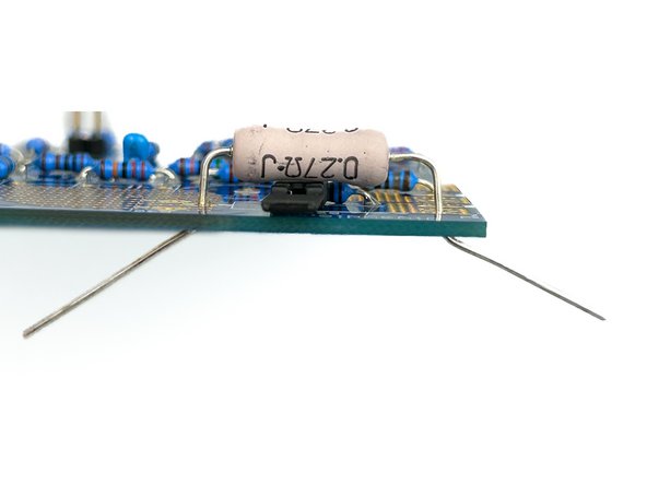 A lead forming tool is helpful.  The pitch for all the large resistors is 23mm.   Bend the leads, so the value will be facing up when the resistor is installed.  It's good practice.  Neatness counts!