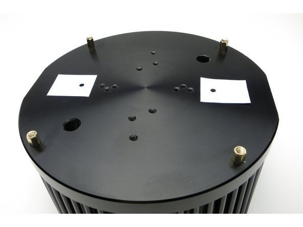 Photo 1 - insulator pads install here. Make sure they are clean and free of any metal crumbs or little solder blobs.