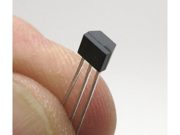 The smaller and more angular of the small-signal transistors is the 2SK370 N-channel Jfet.