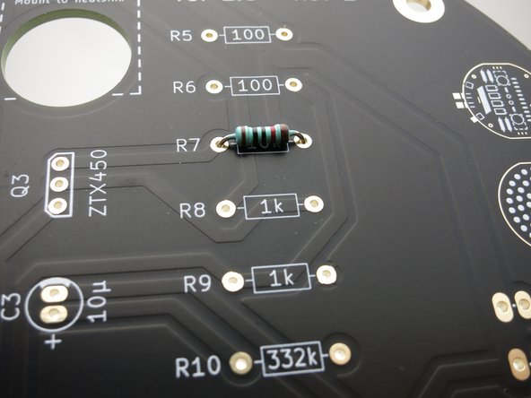 Make sure the resistor sits flat, and with the slightly thicker brown stripe to the right.