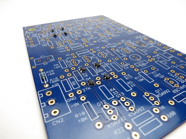 Secure the transistor with the longer pieces of tape and solder one leg.