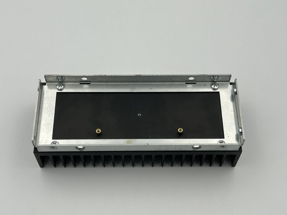 Install the standoffs with 3 x washers between the standoffs and the heatsinks.