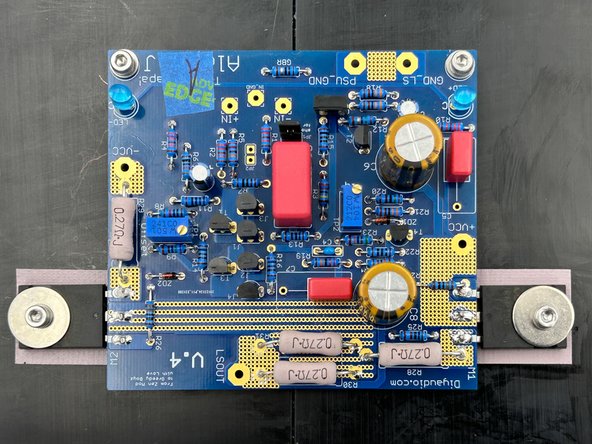 Give the board a little wiggle and allow it to move up and down the MOSFET legs.  Let it settle into place, and give it one last check.  It should be level even when resting only on two standoffs.