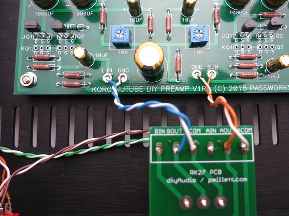 Attach wires from potentiometer to Korg PCB Blue and white/blue for Left.      Orange and white/orange for Right.