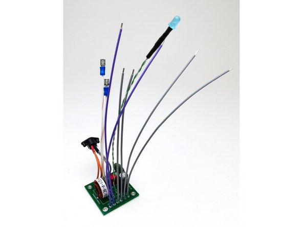 This is the most important photo of this guide - all the wires need to be soldered onto the filter before installation. There is no room to get your iron onto the filter board once it’s mounted.