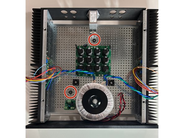 Place the back panel, front panel, and heatsinks around the baseplate to ensure clearances.  There's no need to bolt anything into place at the moment.  Place the PSU PCB onto the baseplate.  Visualize the wire routing.