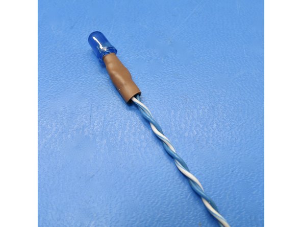 Insert electrical tape to keep leads separated and covered.