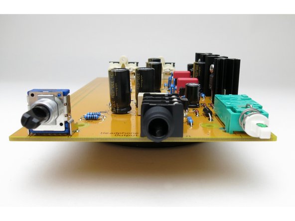 Make sure all these components are sitting on the PCB low and square, failure to do so will result in it not properly lining up with the chassis openings.