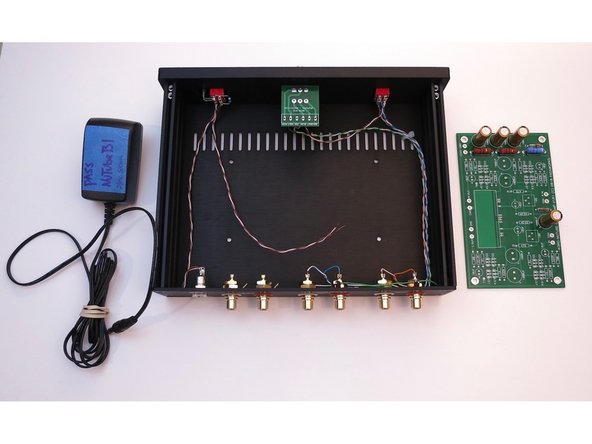 Get the wall wart, the wired chassis, a piece of paper or something non-conductive to insulate the board from the metal, and the PCB Wires from middle of power switch. Brown is barrel center, white/brn is tab.