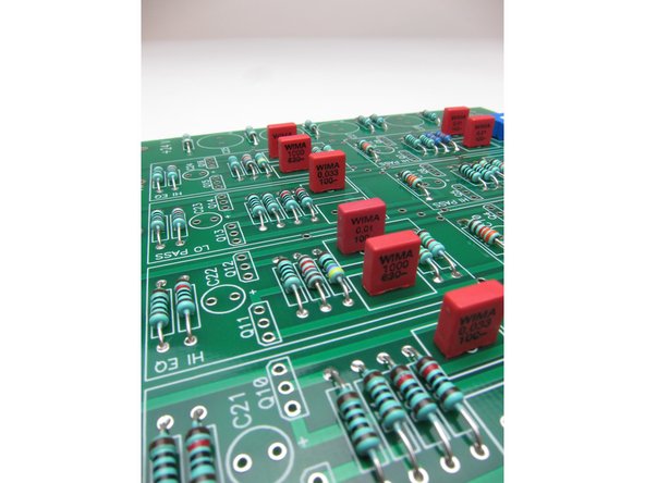 Once the resistors, pots and xover caps are installed,  next install all the transistors, small can caps, and large can caps.