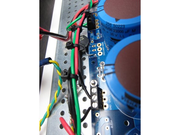 Safety earth (Green Yellow) is connected from the power switch module to the chassis. Use a star washer to ensure a solid connection.