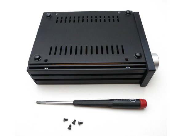 Photo 2 and 3 - It's helpful to align the nuts in the rails with the holes before attaching the bottom panel with the screws.