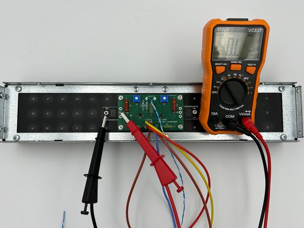 Check the resistance between the two bolts mounting the MOSFETs.  It should be less than a few Ohms.  If not, DO NOT proceed.