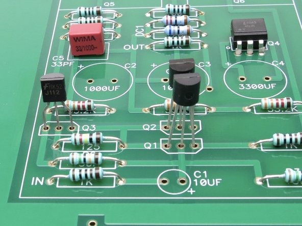 The flat of the transistors aligns with the flat of the transistor mark on the silkscreen.