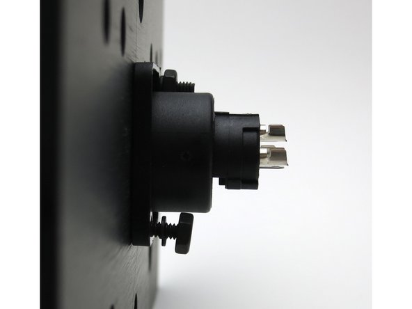 All of the connections to the outside are on the back panel. Follow the next few steps to get the jacks and connects properly installed and wired.