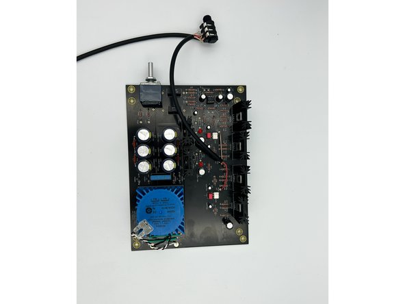 Remove approximately 1/3 of the strands of the exposed bare copper shield wire (it's too large for the PCB).  Twist the bare copper shield wire tightly, and tin the ends of all wires.