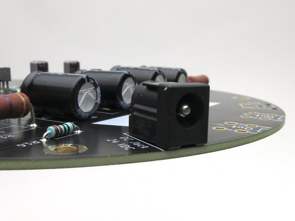 Make sure the DC power jack is flat and square on the PCB before soldering.