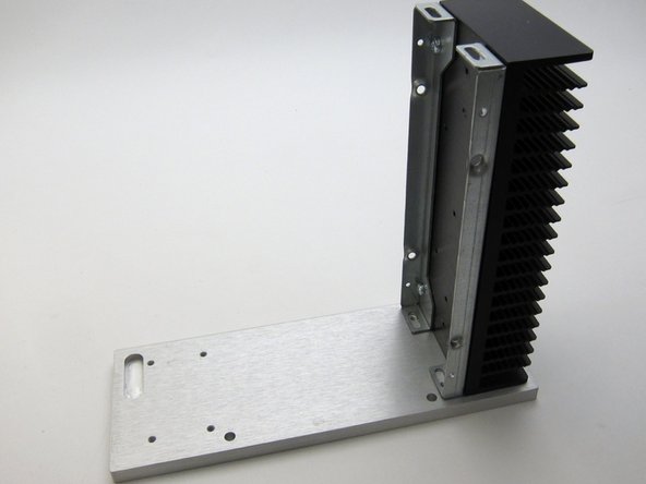 First image: Align slots with the holes in the front panel