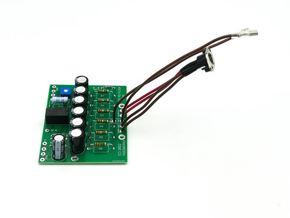 Photo 1 - 2 x 6&quot; lengths of thick brown wire and two small female Faston-type connectors.