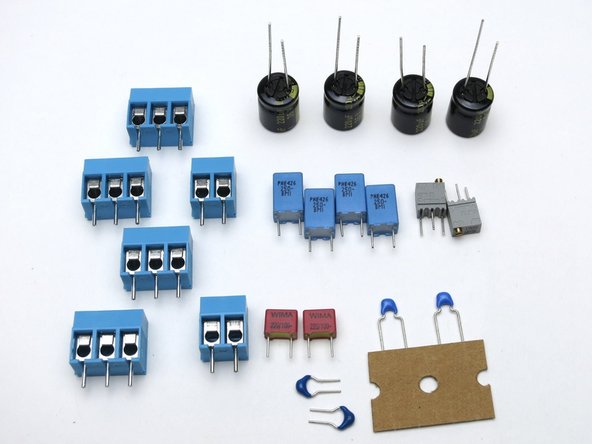 Please note the 10pF capacitors are the two on the tape, the 5pF are loose.