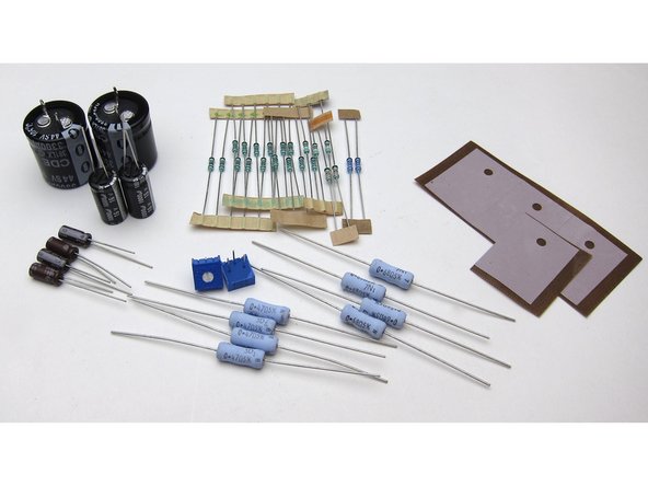 Get the resistors and capacitors, and place the keratherm insulators aside for the moment.