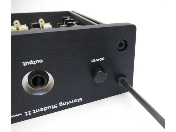 Front panel attached to side rails with black hex-head screws.