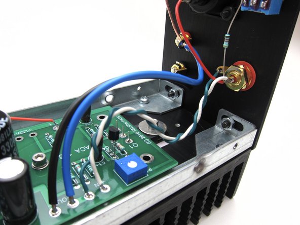 Photo 2 and 3 show input (from RCA) and wiring to speaker posts on the top edge.