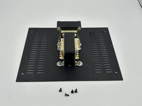 Note - the bottom panel must be oriented as shown in photo 2. It should sit flush against the front panel and have a slight (3mm) overhang beyond the back of the heatsinks.