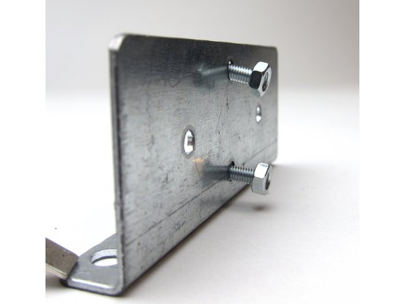 The hardware is attached to the bracket