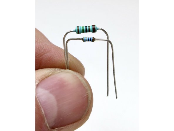 Kits packages in spring of 2022 include the the very nice, but small, premium,  European-made, Vishay MBA series resistors. Albeit a small package, these are ceramic bodied and 0.4W (almost 1/2W) max dissipation, and we are using them in lieu of the more common 1/4W (0.25W).