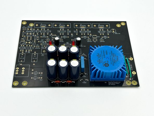 Verify the orientation of the electrolytic capacitors!  The negative side a.k.a. the cathode is indicated with a band.  The cathode lead is the shorter of the two leads.  The positive side a.k.a. the anode is the longer of the two leads.  The anode aligns with the square pad.  A (+) is also indicated on the silkscreen.