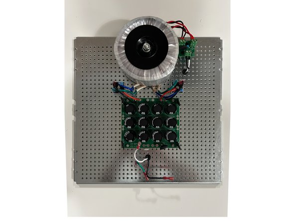 Depending on your previous choices for wiring / connections your steps may differ slightly.  For this build, the main PSU board will be temporarily mounted for wiring and DC voltage testing.  This build uses red for DC+ and black for DC- wiring between the rectifiers and the main PCB.