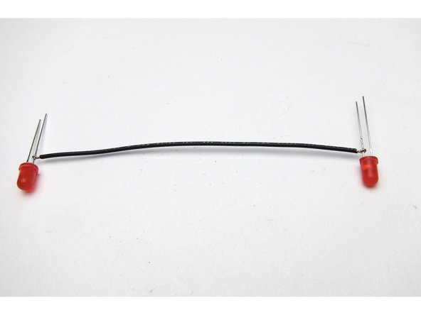 There are 2 LED holes in the chassis, so the LEDs need to be wired together. I choose series to make the light output dimmer.