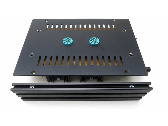 Put nuts into the aluminum side rails and secure top plate with small black countersunk screws.