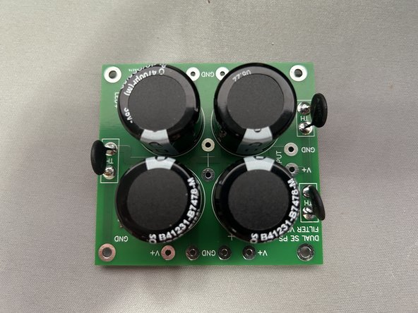 The benevolent DIY fairies included an additional PSU filter board and parts as shown in the photo.  We recommend saving these for another project and using the parts shown in the following steps with your VFET amplifier.