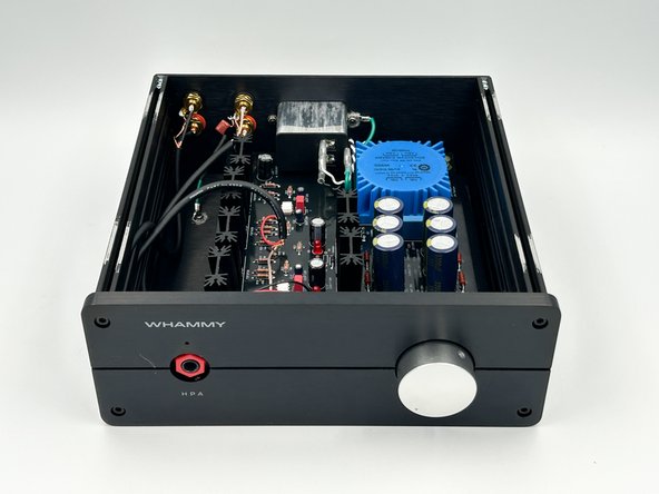 Using the black M4 cap-head screws included with your chassis, install the front panel.  The front panel should fit perfectly over the volume pot.