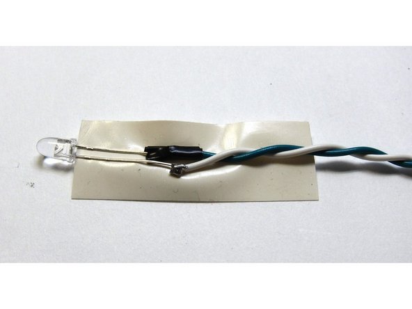 A bit of tape on one on the solder joints