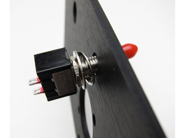 Second image: Star washer on the inside touching the chassis