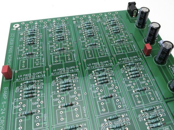 The film caps on the edges, the red ones in the photo, are actually part of of the power supply and are merely film bypass caps.