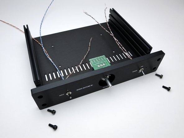 Photo 3 - The screws go the threaded section, not the channel where the nuts are.