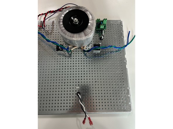 Using the PEM on the back plate as a rough guide for length.  Cut the mains wiring to length at the Mains AC Hook Up board.