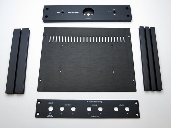 The photos in this guide were made using the pioneer batch chassis which had vents in the covers. The production run of B1K chassis has upgraded covers without vents. This is an intended improvement to the original design that helps control microphonics, based on testing and research from our pioneer batch beta testers.