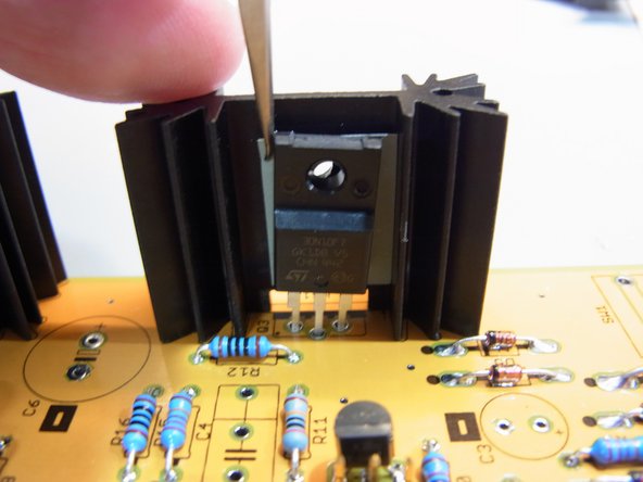 Attach with screw and nut.