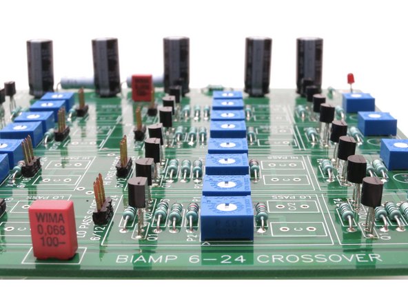 Then solder the center leg of the pot only, flip back over, make a little adjustment to get it all squared up and in the lines as best as possible, and solder the remaining legs.