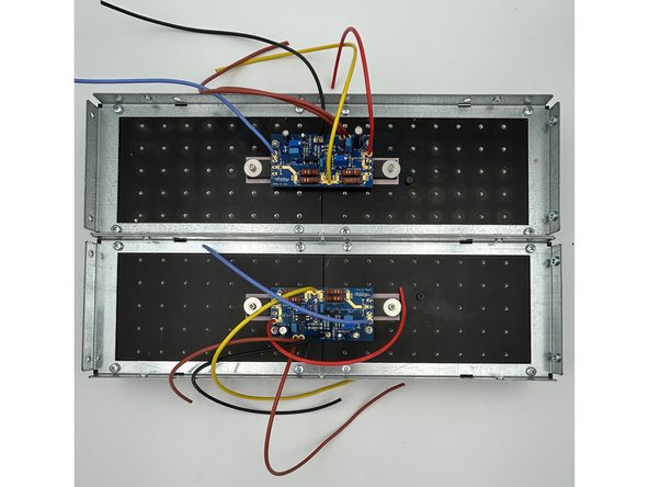 Mount the PCBs to the standoffs using the short M3 bolts in the back panel parts kit and an M3 washer. There is no reason to over-tighten.